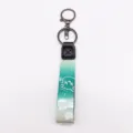Gradient woven strap keychain with cute bear design, stylish bag charm and key holder accessory. - Green