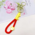 Leuke kattenpoot PVC lederen touw sleutelhanger met metalen ring en karabijnhaak accessoire. - Rood