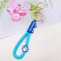 Blauwe PVC leren touw sleutelhanger met kattenpoot en duurzame gouden metalen ringen. - Blauw
