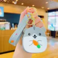 Schattige grijze hamster siliconen portemonnee sleutelhanger met wortel hanger kinderen. - Hamster Muntportemonnee - Grijs