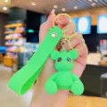 Schattige groene cartoon beer sleutelhanger met siliconen polsbandje en metalen ring. - Groen