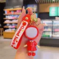 Cute glowing doll keychain and bag pendant, creative couple gift and lovely backpack accessory. - Red Skirt (Female)