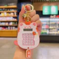 Cute fruit cat calculator keychain, creative silicone cartoon school bag pendant gift. - White