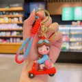 Cute cartoon scooter keychain girl bag charm and car key ring pendant for daily use and gifts. - Red Vehicle Girl