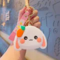 Cute cartoon white rabbit silicone keychain coin purse with lovely pink wrist strap. - White