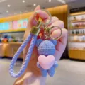 Purple woven cute bear keychain with pink heart charm, stylish bag pendant accessory. - Purple