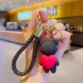 Cute black bear keychain with red heart pendant, resin cartoon bag charm car keyring accessory. - Black