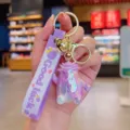 Colorful iridescent monster keychain with purple strap, cute cartoon variant hanging ornament. - Iridescent Cabbage Man / Purple