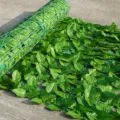 Artificial green leaf fence privacy hedge roll fake plant ivy netting for garden balcony decor. - Lattice Panel with Light Apple Leaves