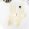 Cream white mid-tube socks featuring a bold letter C, vintage style, perfect for autumn and winter. - One Size / Letter C / White