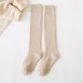 Beige knitted over-the-knee socks for women, cozy winter long stockings variant. - One Size / 06 Beige