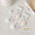 Fluffy coral fleece mid-calf socks for women, cozy winter thermal floor socks with colorful hearts. - One Size / White Heart