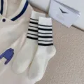 Cozy women's mid-tube cotton socks featuring classic black and white horizontal stripes. - One Size / 05 White with Black Stripes