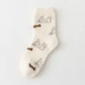 Women thick cotton mid-tube socks featuring cute dog pattern, warm winter casual hosiery. - One Size / Off White