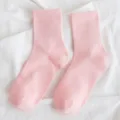 Calze da donna a costine rosa a metà polpaccio, morbide e confortevoli da indossare. - Rosa Pesca