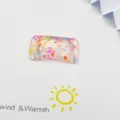 Resin candy charm detail shot with colorful confetti inside, perfect for DIY crafts. - Candy No. 6