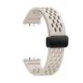 Silicone replacement watch band with breathable holes and magnetic folding clasp for smart watch. - Starlight