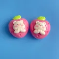 Cute pink strawberry resin charms with white bear design, perfect for DIY phone case crafts. - Strawberry Bear