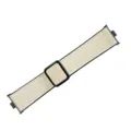 Beige litchi leather smartwatch strap detail with black metal connector and magnetic clasp. - Litchi Pattern Leather - Ivory