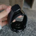 Black litchi grain leather watch strap replacement with magnetic folding buckle for smart watch. - Black