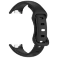 Black silicone replacement watch band close-up view showing metal connector and loop design. - Black