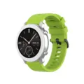 Detailed view of smartwatch with silver case, black dial and vibrant green silicone strap. - Green