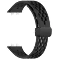 Black silicone replacement smartwatch band with breathable holes and magnetic folding buckle detail. - Black
