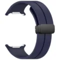 Close-up detail of dark blue silicone watch strap with secure magnetic folding clasp. - Midnight Blue