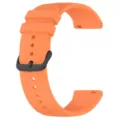 Orange silicone watch strap detail, featuring black buckle and quick release pins. - Orange
