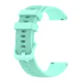 Mint green silicone watch strap close up view, featuring textured surface and buckle. - Teal