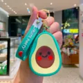 Süßer Cartoon Avocado Silikon Münzbeutel Schlüsselanhänger mit Gurt, Paar Geschenke. - Obst Münzbörse - Avocado