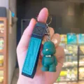 Green bow tie bear keychain, cute resin animal pendant with wrist strap for car keys. - Green Nordic Bear