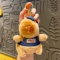 Cute capybara plush keychain, stuffed animal bag charm with denim bib, blue variant. - Denim Overalls with Hat