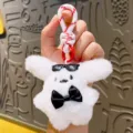 Cute plush puppy keychain with bow tie and pixel glasses, soft bag pendant gift for friends. - Black Bow Tie