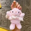 Pink plush long-eared rabbit keychain with floral bow cute bunny bag charm accessory - Pink
