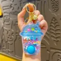 Cute water game keychain ring toss toy stress relief portable mini nostalgic toy - Cake Water Game - Blue