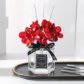 Home fragrance diffuser set with red artificial hydrangea flowers, glass bottle, and reeds. - Rose - 50ml