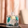 Bottiglia di diffusore di profumo in vetro trasparente con bastoncini bianchi e fiori. - 120ML Campanula