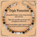 Triple protection bracelet with Tiger Eye, Hematite, and Black Tourmaline on a card - Triple Protection Theme (Silver Rectangle)