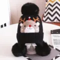 Kids winter warm knitted hat with cute reindeer pattern, triple pom pom design, cozy ear flaps. - Black