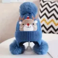 Kids winter knitted hat with cute reindeer pattern, warm earflap beanie and lovely pom poms. - Blue