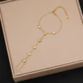Bracciale da dito in acciaio inossidabile dorato con ciondoli a cuore delicati per donna. - Stile 9