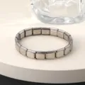Stainless steel modular link bracelet detail, elastic square design for DIY jewelry making. - Silver