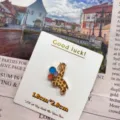 Cute cartoon giraffe enamel pin with colorful balloons, metal badge for backpack and clothes. - Balloon Giraffe (With Card)