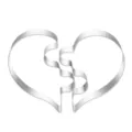 Detailed view of the stainless steel heart puzzle cookie cutter, perfect for romantic baking. - Heart Puzzle