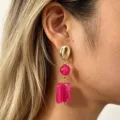 Close-up detail of French retro gold shell and pink resin block dangle earrings worn. - Rose Red