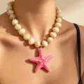 Close up detail view of pink starfish pendant beaded necklace, colorful acrylic fashion jewelry. - Deep Pink
