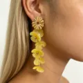 Fashion long flower drop earrings with golden metal top and translucent yellow resin petals. - Yellow