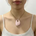 Chic minimalist pink acrylic oval pendant necklace featuring durable stainless steel chain. - Pink