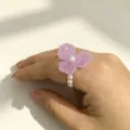 Detailed shot of a purple acrylic flower ring with cute pearls, Korean fresh style jewelry. - 3#